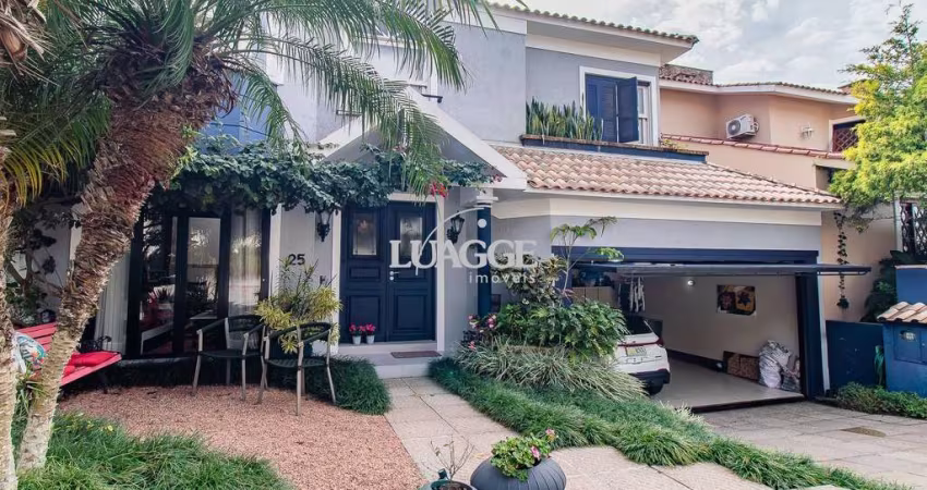 CASA DE 4 DORMITÓRIOS EM CONDOMÍNIO - 320 m² - 4 VAGAS DE GARAGEM