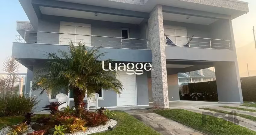 Casa em condomínio fechado com 5 quartos à venda na Rua Rio Novo, 2138, Atlântida, Xangri-Lá
