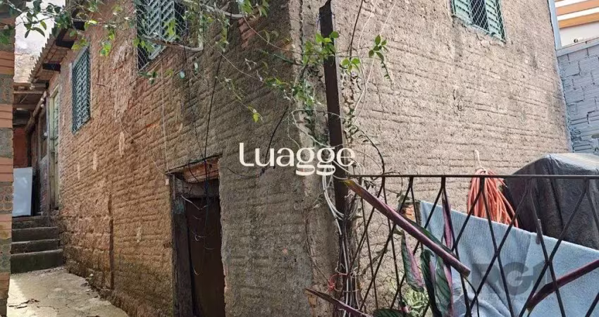 Casa com 3 quartos à venda na Rua Marquês do Maricá, 1038, Vila Nova, Porto Alegre