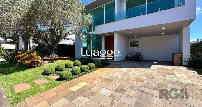 Casa em condomínio fechado com 5 quartos à venda na Rua Rio Novo, 2765, Atlântida, Xangri-Lá