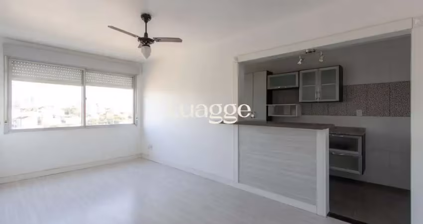 Apartamento semimobiliado à venda no bairro cristal, 2 dormitórios, 2 banheiros, 1 vaga coberta e vista livre para o guaíba