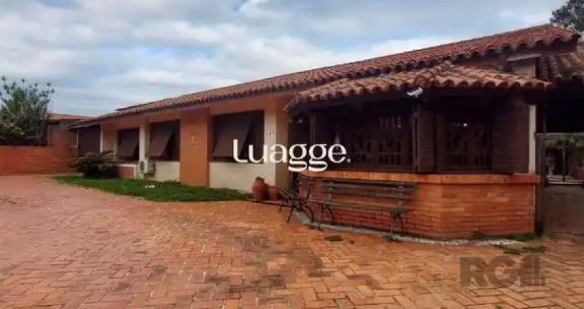 Casa com 5 quartos à venda na Rua Cariri, 261, Vila Assunção, Porto Alegre