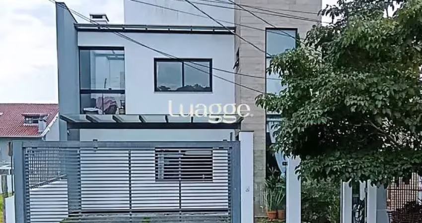 Excelente casa de alvenaria, 4 dormitórios, 2 suítes e 2 vagas de garagem.