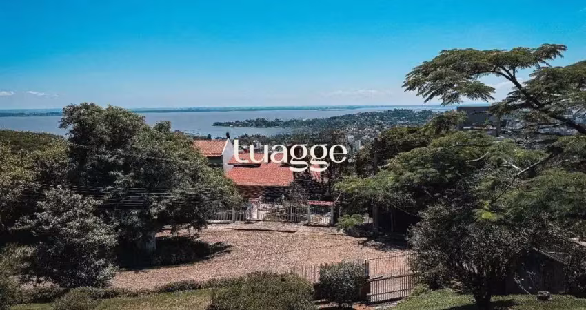Casa bairro sétimo céu, 463m² privativos, vista privilegiada do rio guaíba em terreno de 1.423m².