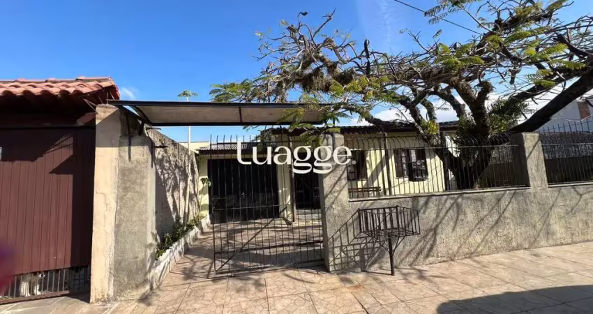 Casa com 3 quartos à venda na Rua Criciúma, 371, Guarujá, Porto Alegre