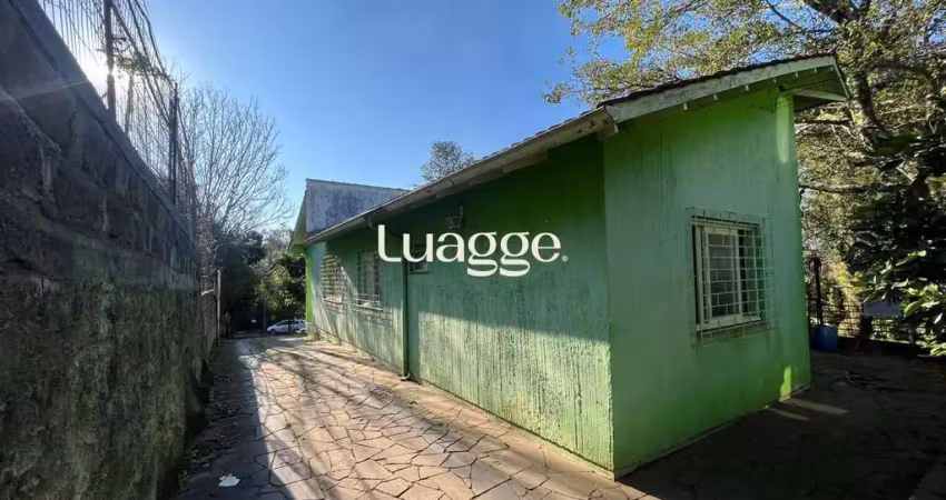 Terreno amplo com 3 casas – vila nova, porto alegre