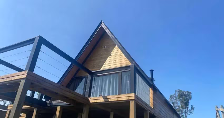 Terreno de 1.500m² com chalé  entre águas mornas e rancho queimado