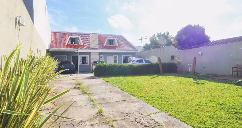Linda casa terrea com excelente espaço de jardim e estacionamento