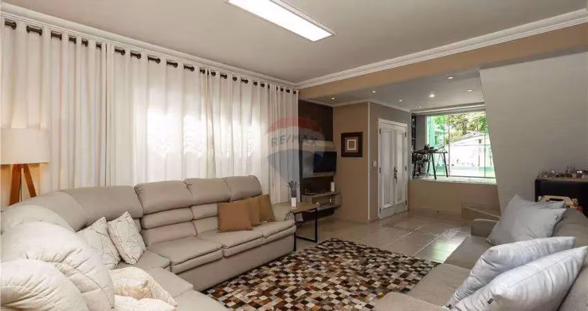 Encantadora residência com 3 suítes e acabamento de alta qualidade.- porteira fechada-