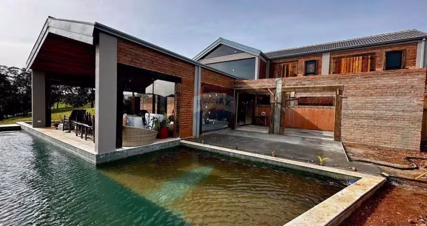 Luxo e natureza: casa de sonho em joanópolis pé na água