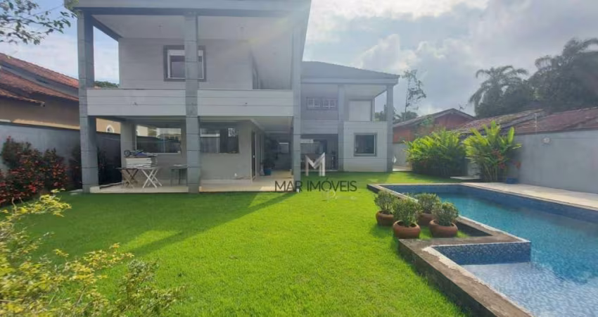 Casa em condomínio Fechado na praia de Pernambuco no Guarujá com 5 suítes