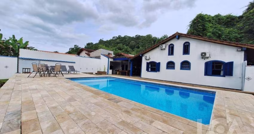 Casa com 4 dormitórios à venda, 300 m² por R$ 1.300.000,00 - Massaguaçu - Caraguatatuba/SP
