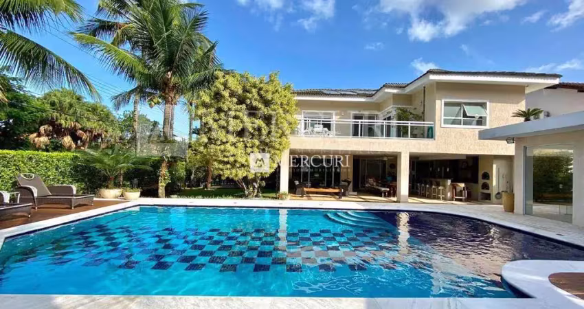 Casa no guarujá, enseada, condomínio fechado, 5 quartos, sala para 3 ambientes e espaço gourmet com piscina - mercuri imóveis - imobiliária no guarujá
