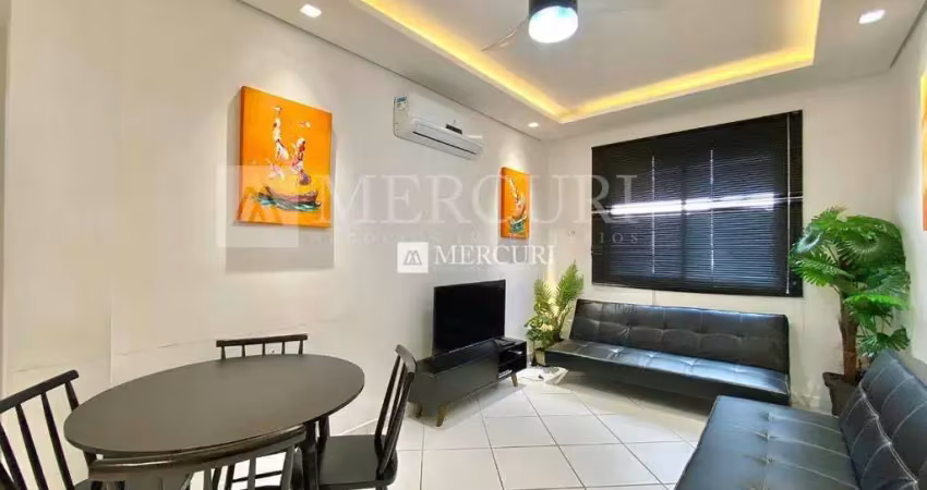 Apartamento no guarujá, enseada, 1 quartos, sala para 2 ambientes e cozinha com armários - mercuri imóveis - imobiliária no guarujá
