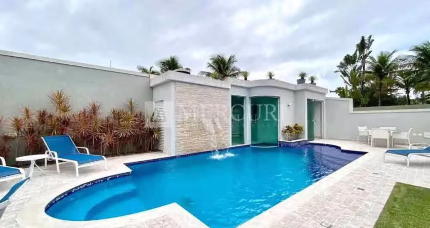 Casa no guarujá, condomínio fechado, jardim acapulco, 5 suítes- mercuri imóveis guarujá