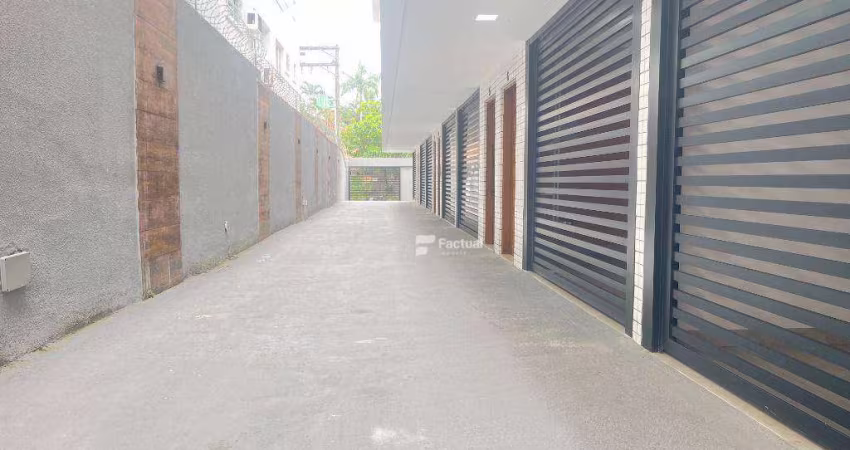 Village com 3 dormitórios à venda, 140 m² por R$ 650.000,00 - Enseada - Guarujá/SP