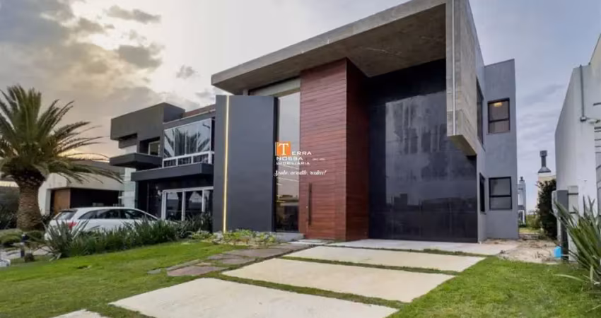 Casa mobiliada,  04 suítes no condomínio riviera em  xangri-lá - rs