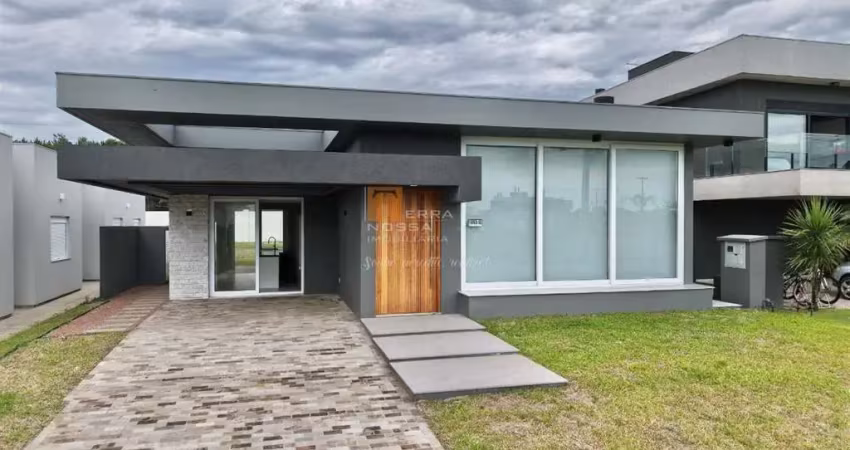 Casa 04 suítes em condomínio fechado em capão novo - rs