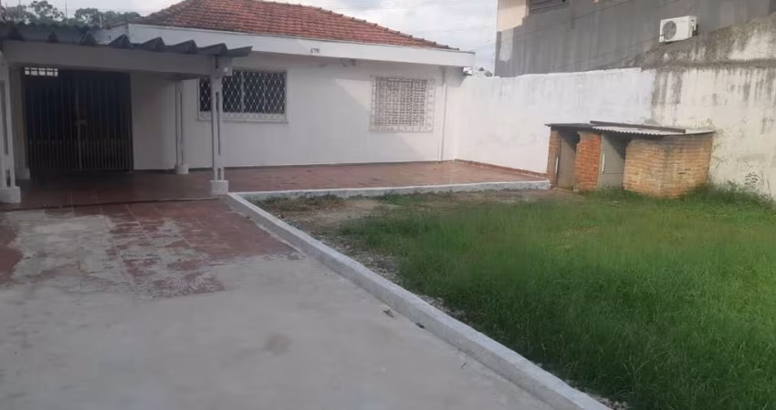 CASA TERREA COM QUINTAL AMPLO FL26