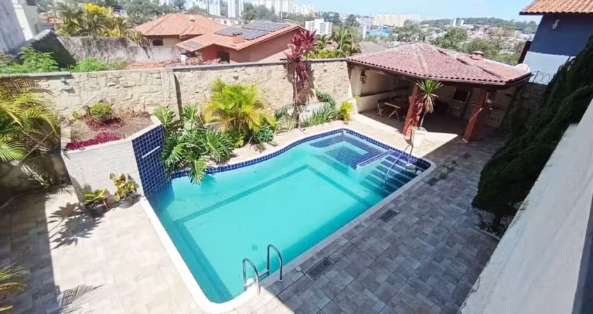 Sobrado em condominio com 5 suites e piscina e 3 vagas no pq dos principes
