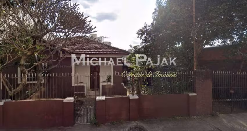 Terreno composto por uma casa, uma oficina mecânica, um restaurante e uma pizzaria delivery