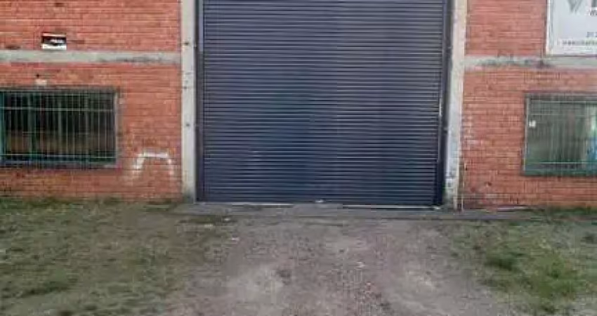 Pavilhão comercial/industrial para locação as margens da rodovia 118.