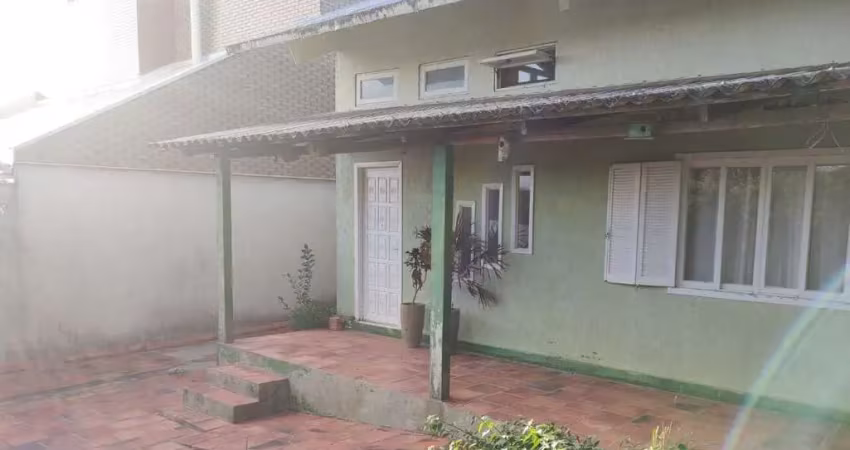Casa com 4 quartos à venda na Avenida das Azaléias, 71, Tarumã, Viamão