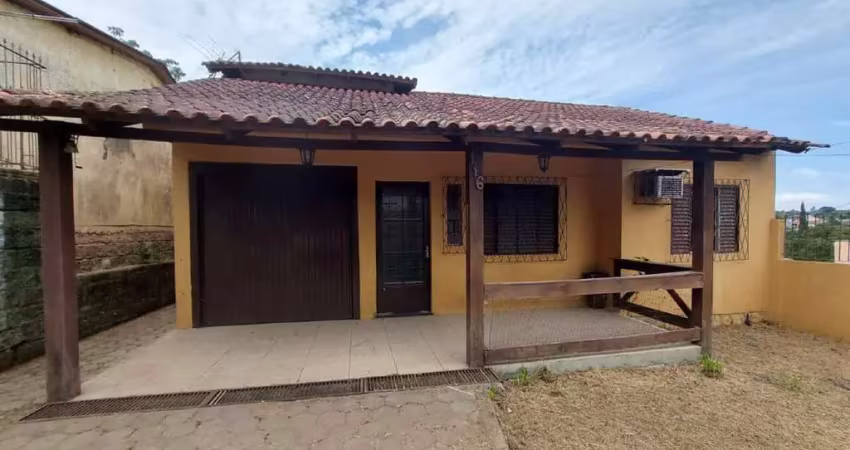 Casa com 3 quartos à venda na Rua Arlindo Itapuan da Costa, 116, Santo Onofre, Viamão
