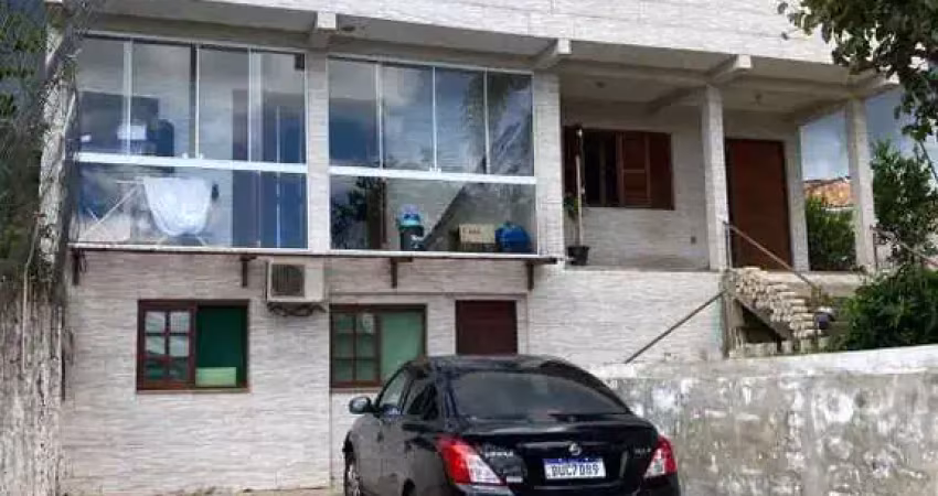 Casa com 4 quartos à venda na Rua Marechal Rondon, 329, Parque Índio Jari, Viamão