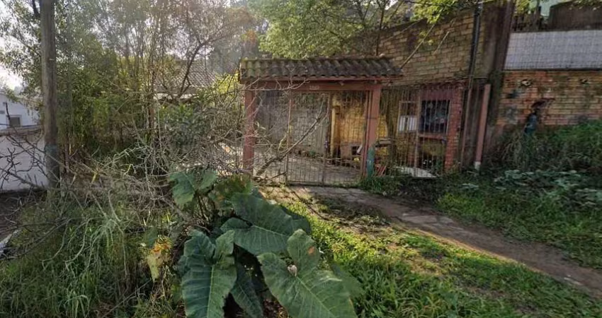 Terreno à venda na Rua Olavo Miranda de Figueiredo, 375, Tarumã, Viamão