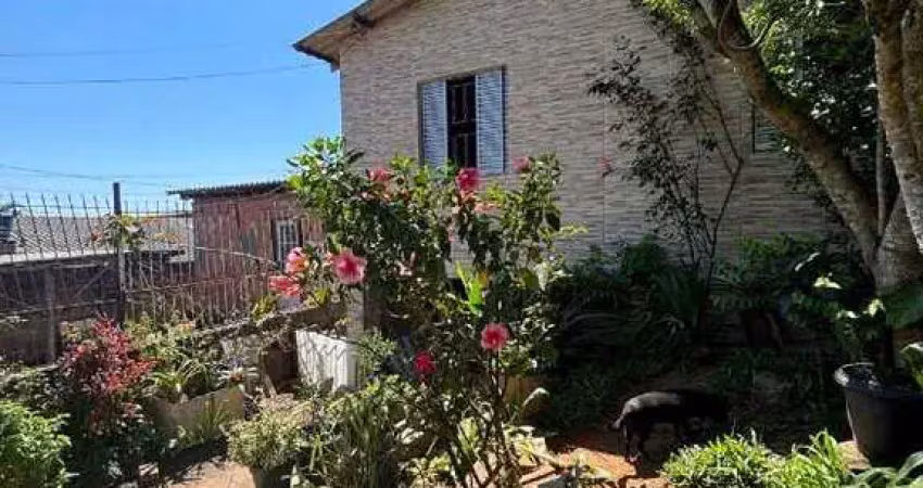 Casa com 2 quartos à venda na Rua Tupis, 116, Parque Índio Jari, Viamão