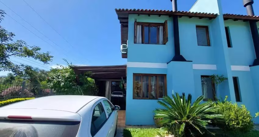 Casa em condomínio fechado com 2 quartos à venda na Avenida dos Ipês Amarelos, 160, Tarumã, Viamão