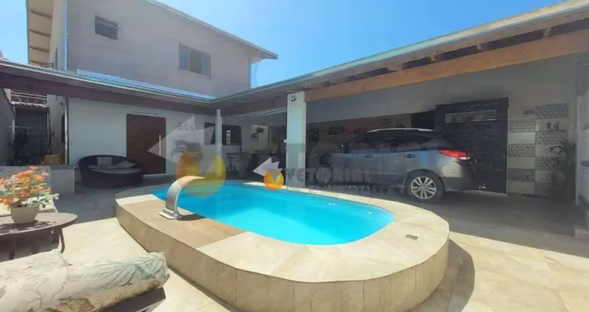 Sobrado com 4 dormitórios à venda, 272 m² por R$ 1.100.000,00 - Poiares - Caraguatatuba/SP