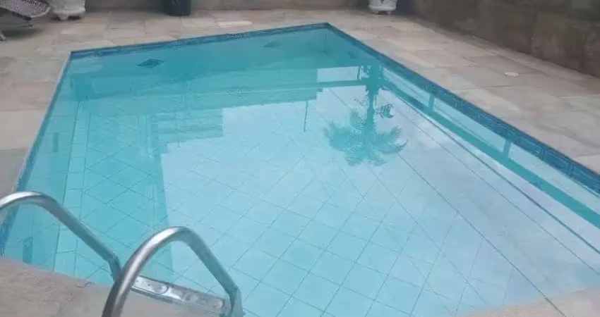Apartamento dois dormitórios sendo uma suíte vila tupi praia grande sp