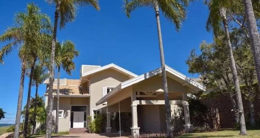 Casa com 5 dormitórios à venda, 673 m² por R$ 3.800.000,00 - Gramado - Campinas/SP