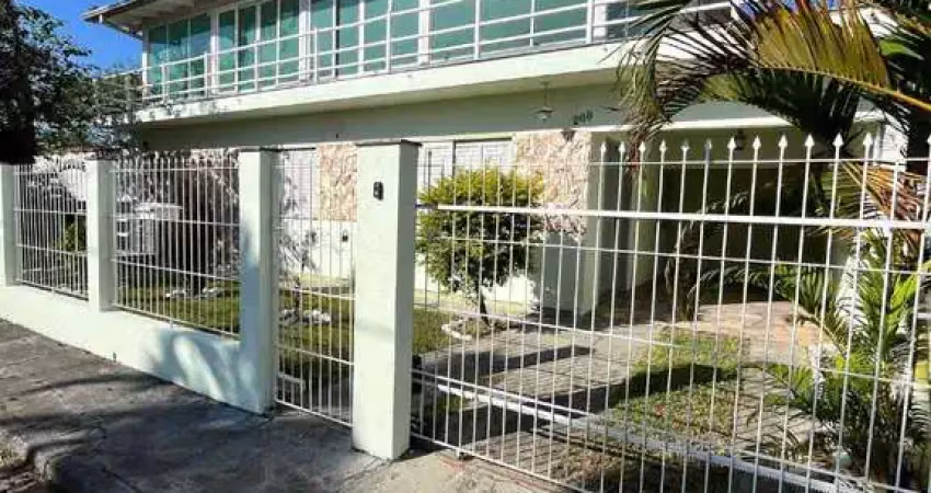 Locação | 480 m², 7 quartos, 2 vagas, varanda com churrasqueira e forno a lenha - palhoça/sc.