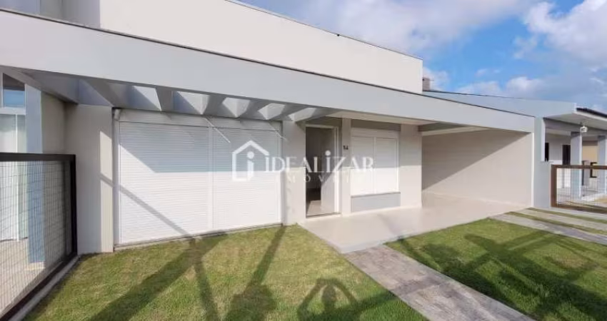Bela casa com 3 dormitórios, sendo um suíte, apenas 50 metros do mar, em Arroio do Sal, no bairro São Pedro.