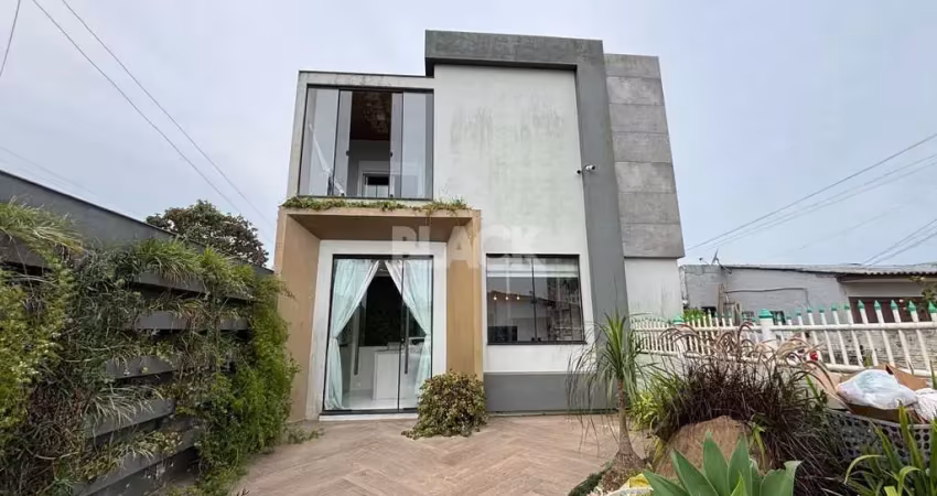 Casa 4 dormitórios à venda Progresso Passo de Torres/SC