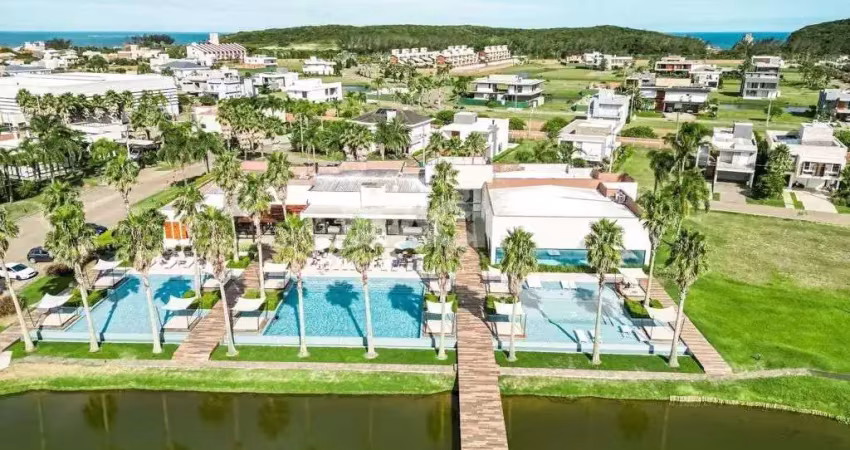 Lote fundos lago no condomínio ilhas park em torres rs