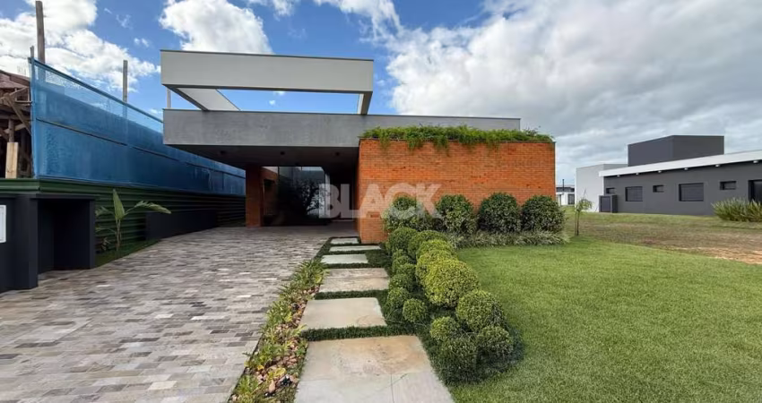 Casa fundos lago no Reserva das Águas em Torres RS