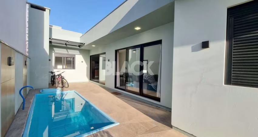 Casa com piscina no Morada das Palmeiras em Torres RS