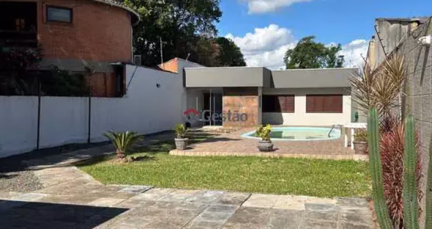 Casa  em niterói, canoas - área urbana com jardim e piscina