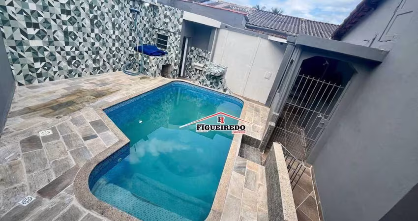 Casa com 2 dormitórios à venda, 182 m² por R$ 570.000 - Caiçara - Praia Grande/SP