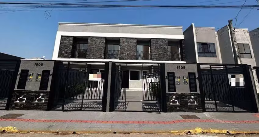Geminado moderno com 2 suítes e garagem para 2 veículos em itapema