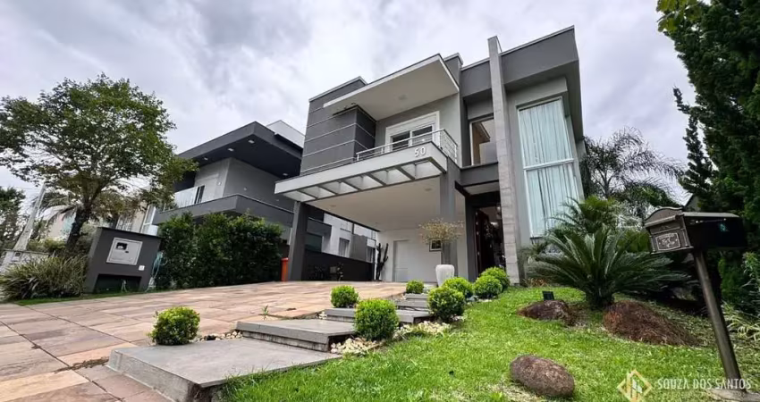 Casa com 4 suítes mobiliada e decorada no condomínio alphaville em gravataí/rs