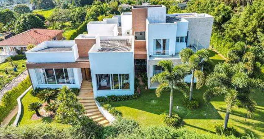 Casa em condomínio para venda com 7 quartos, sendo 6 suítes, 794m²