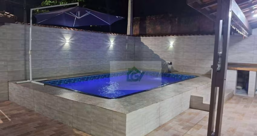 Casa com 3 dormitórios, piscina a 350m da praia à venda, 150 m² por R$ 530.000 - Porto Novo - Caraguatatuba/SP