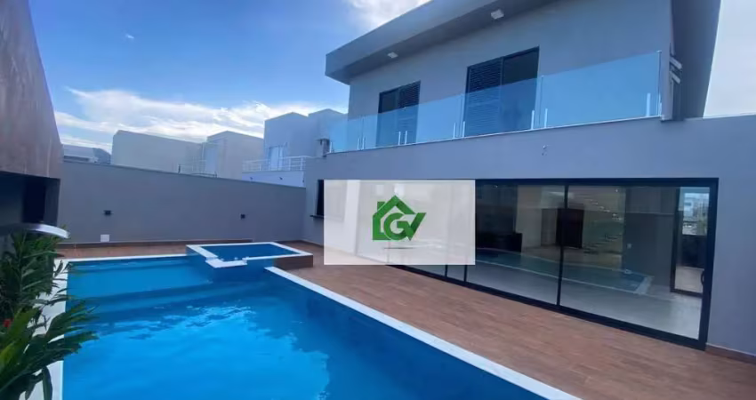 Maravilhosa casa alto padrão em condomínio fechado com 4 dormitórios à venda, 304 m² por r$ 2.700.000,00 - massaguaçu - caraguatatuba/sp