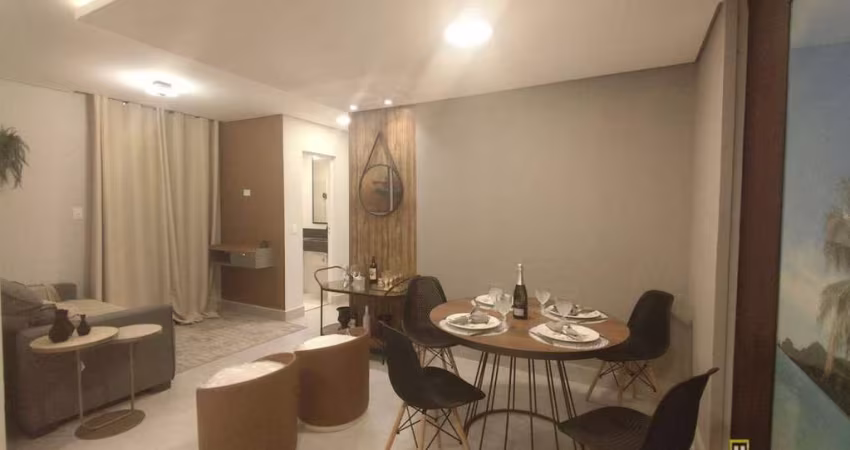 Apartamento semi mobiliado com 2 dormitórios à venda, 56 m² por R$ 340.000,00 - Jardim dos Pássaros - Guarujá/SP