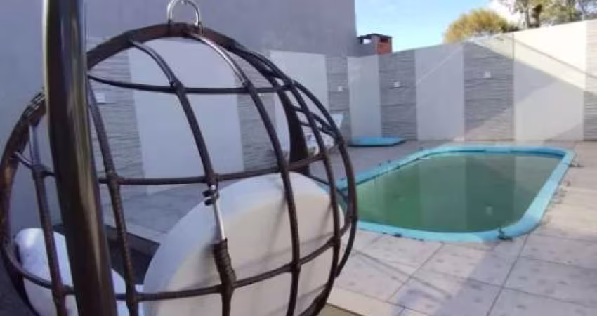 CASA ACONCHEGANTE COM PISCINA EM NOVA TRAMANDAÍ